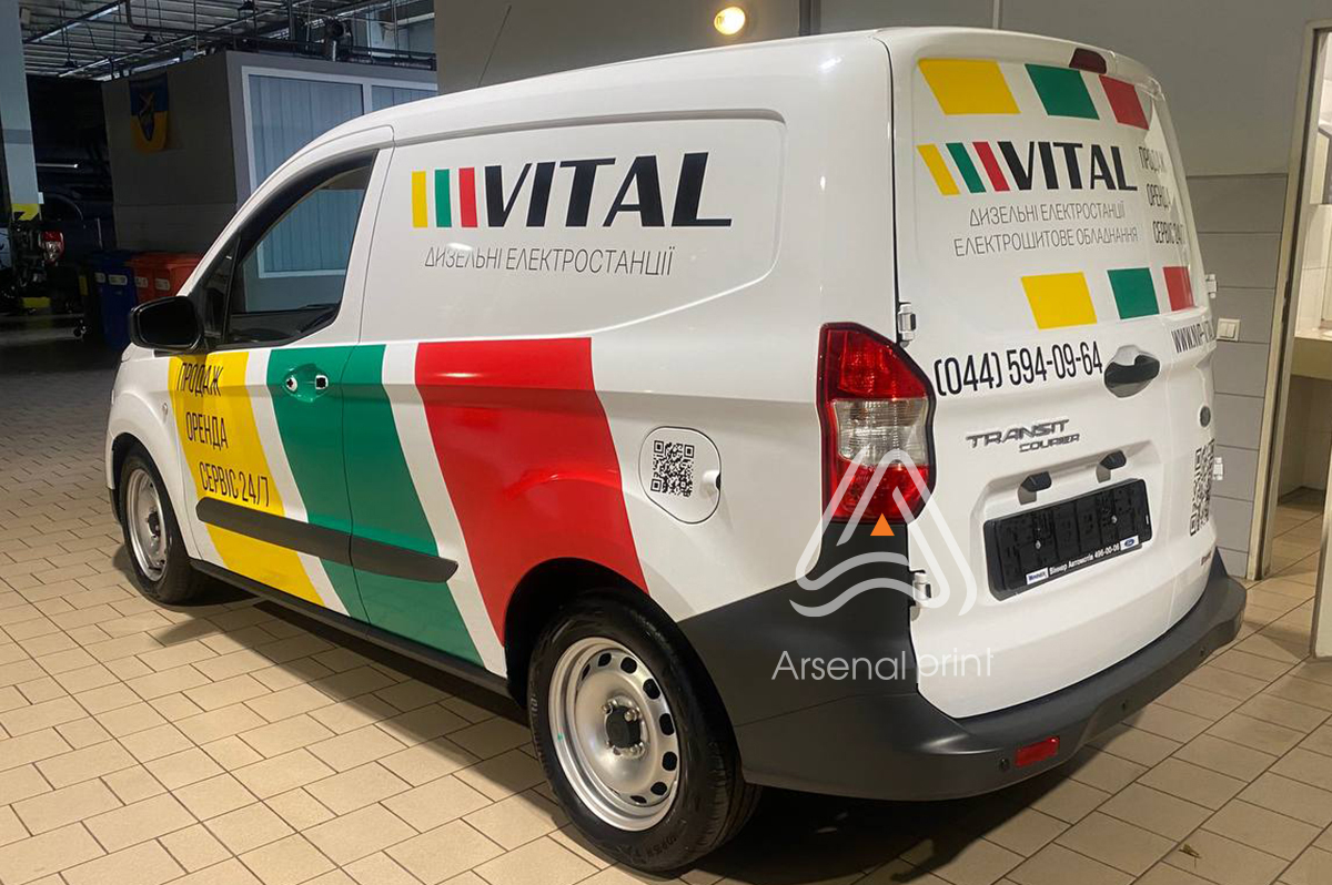 Поклейка автомобіля плівкою - рекламна з логотипами