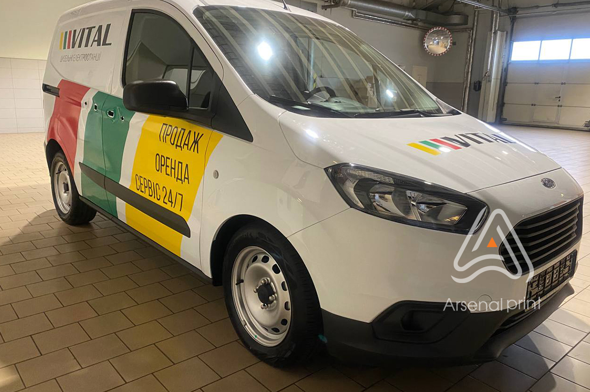 Заклейка фірмових авто плівкою з телефоном