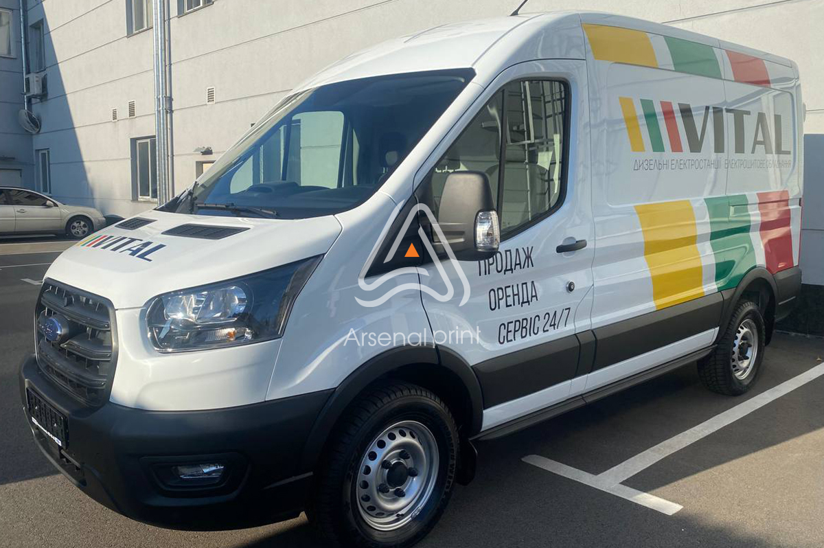 Оклейка рекламою фірменного авто