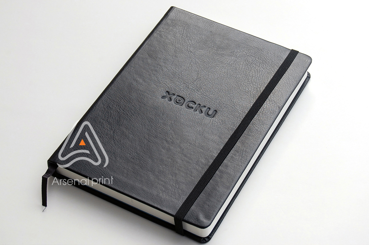 Тиснення на блокнотах логотипа